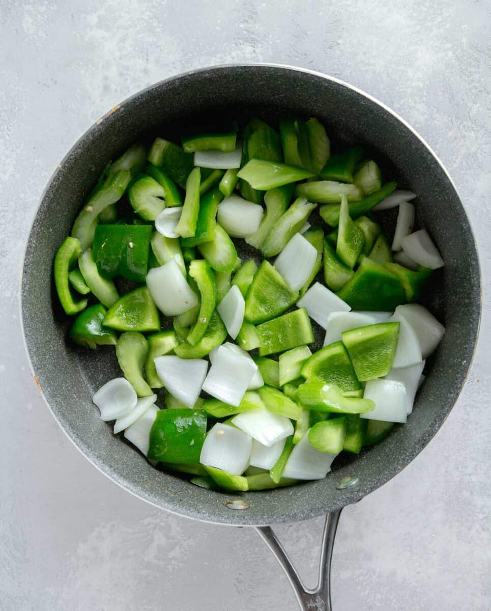 green bell pepper, onion, and celery in a nonstick skillet