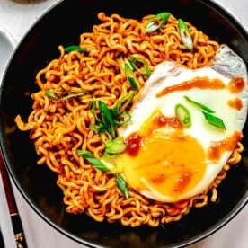 Buldak ramen served in a bowl with an egg.