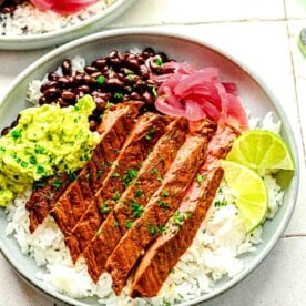 Garlic guajillo steak in burrito bowls.