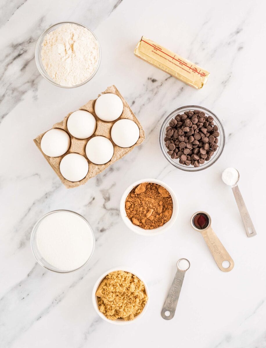 ingredients for brookies are placed on a marble countertop.
