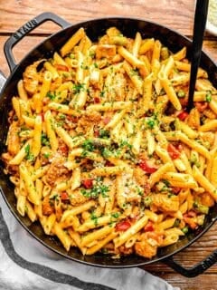 Spicy chicken chipotle pasta in a pan with a fork.