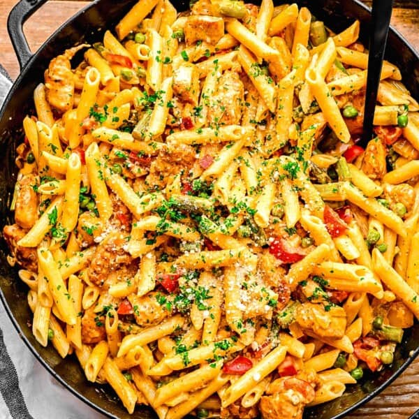 Spicy chicken chipotle pasta in a pan with a fork.