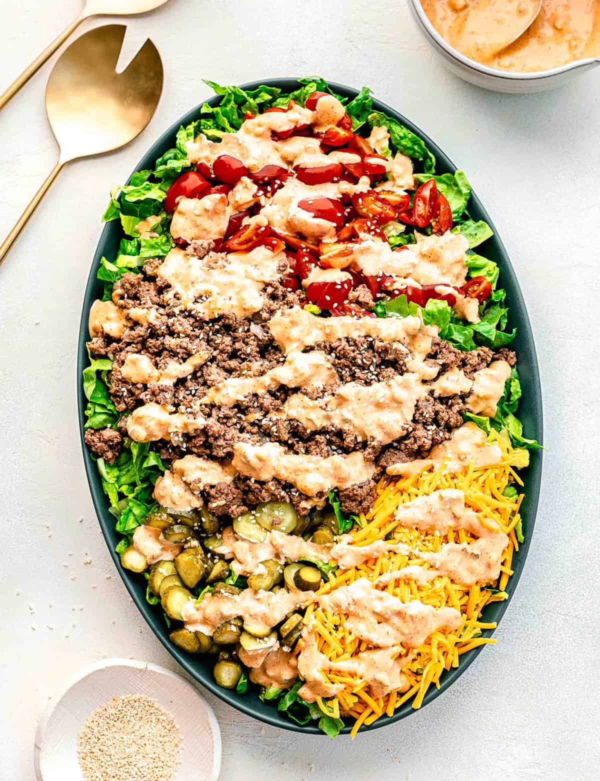 Big Mac salad on a serving platter before being tossed.