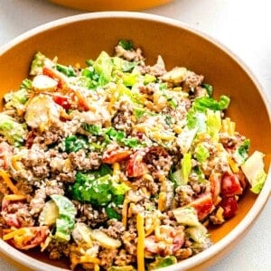 Big Mac salad served in 2 bowls.