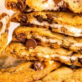 a stack of stuffed cookies are presented close up.