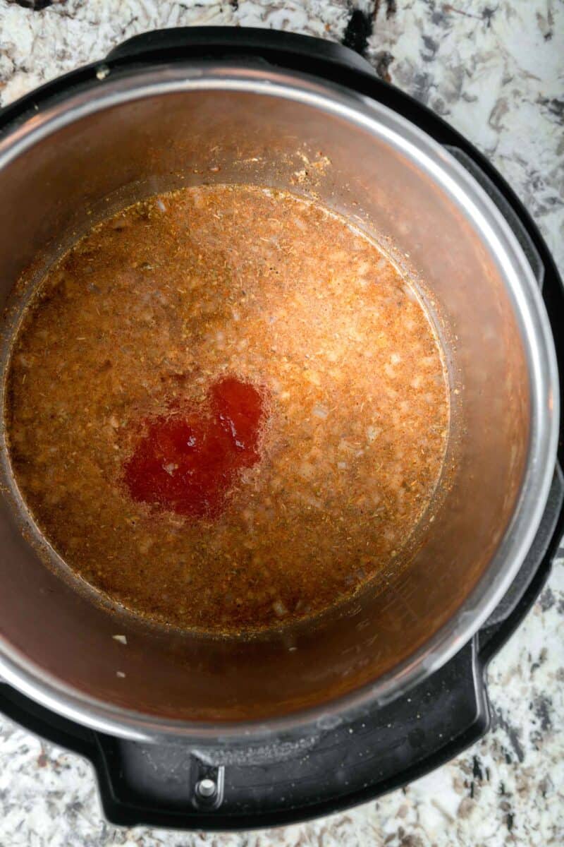 tomato sauce added into the insert of the instant pot