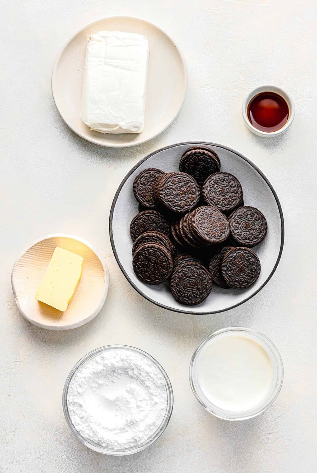 Ingredients for Oreo pie separated into bowls.