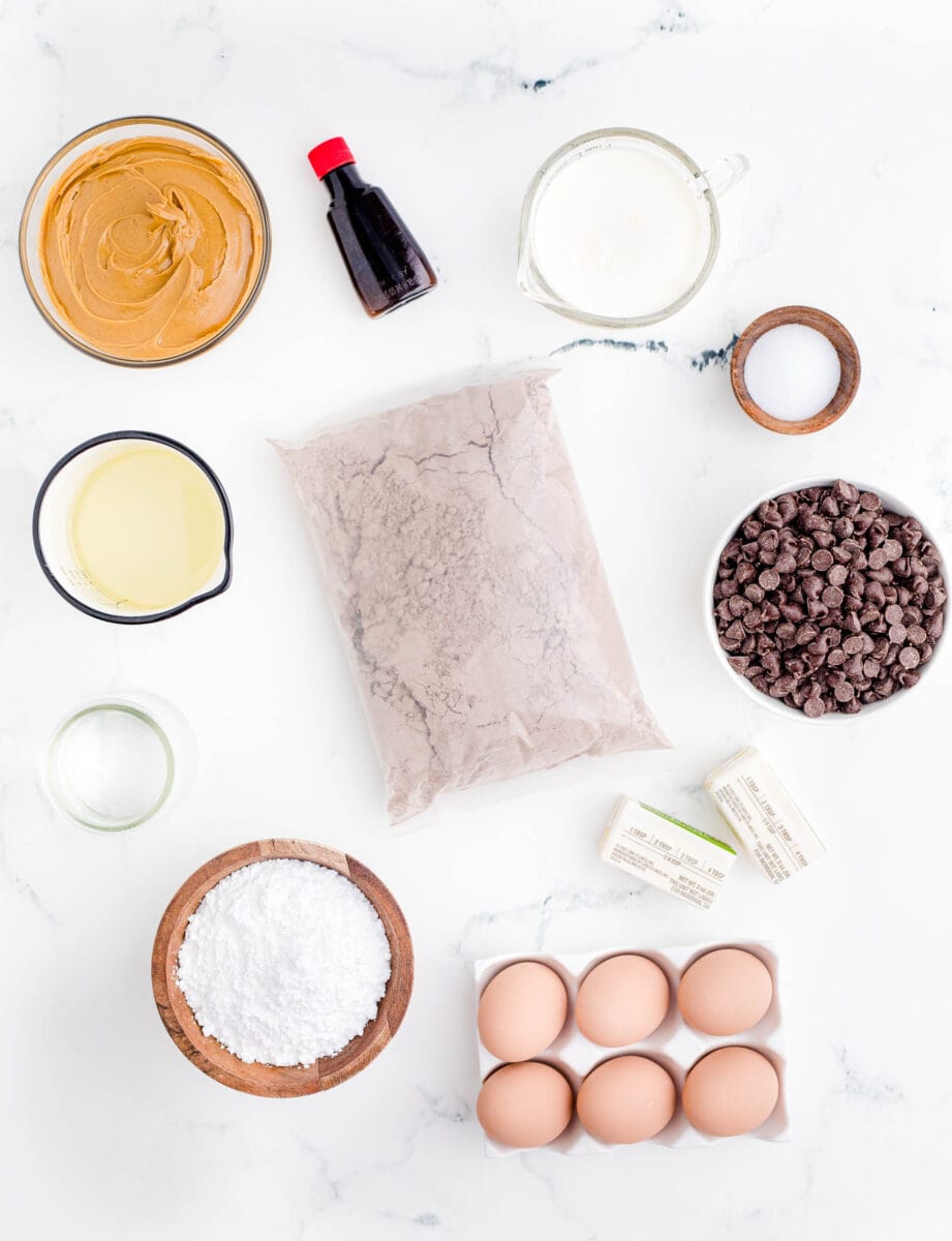 the ingredients for buckeye brownies are placed on a white surface