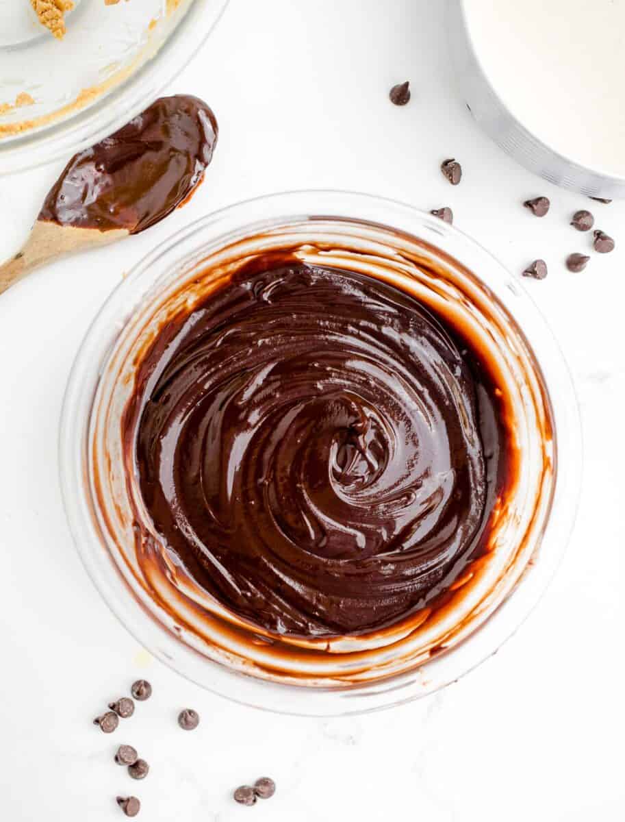 a chocolate mixture has been stirred in a glass mixing bowl