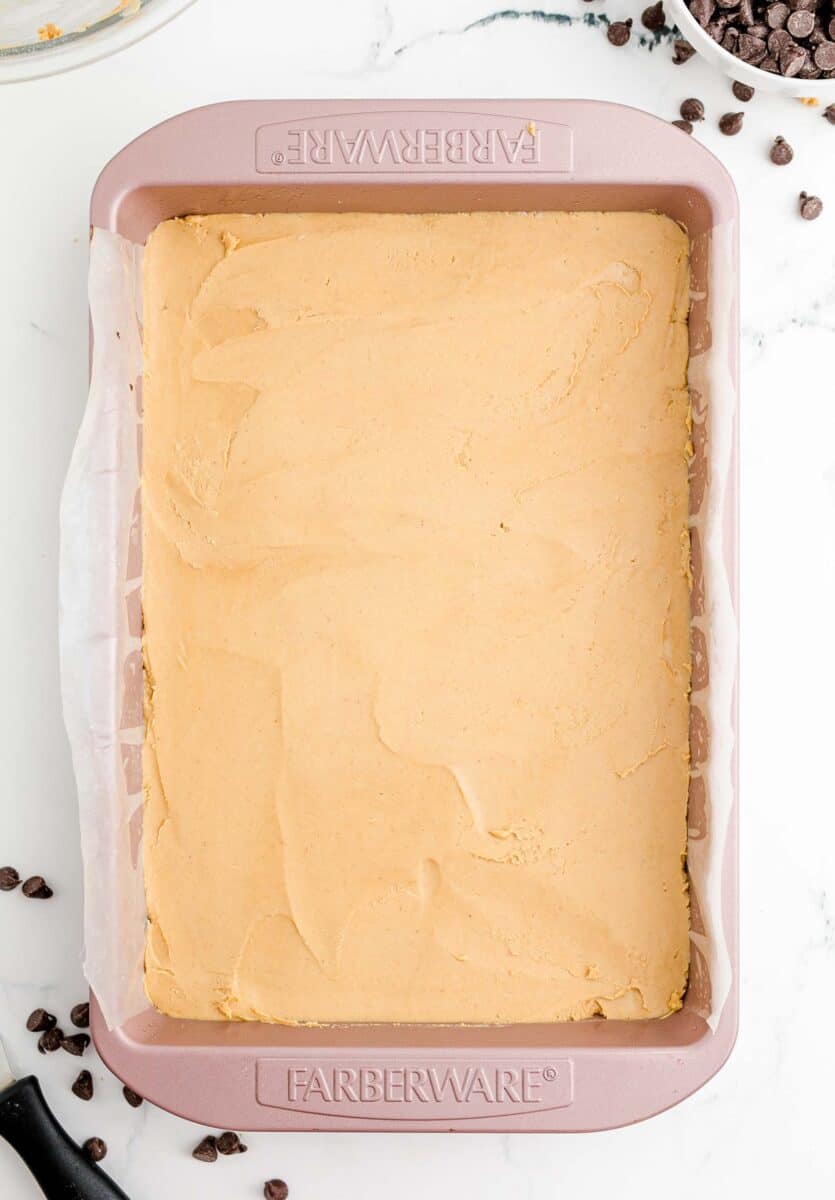 a peanut butter layer is presented in a large pan