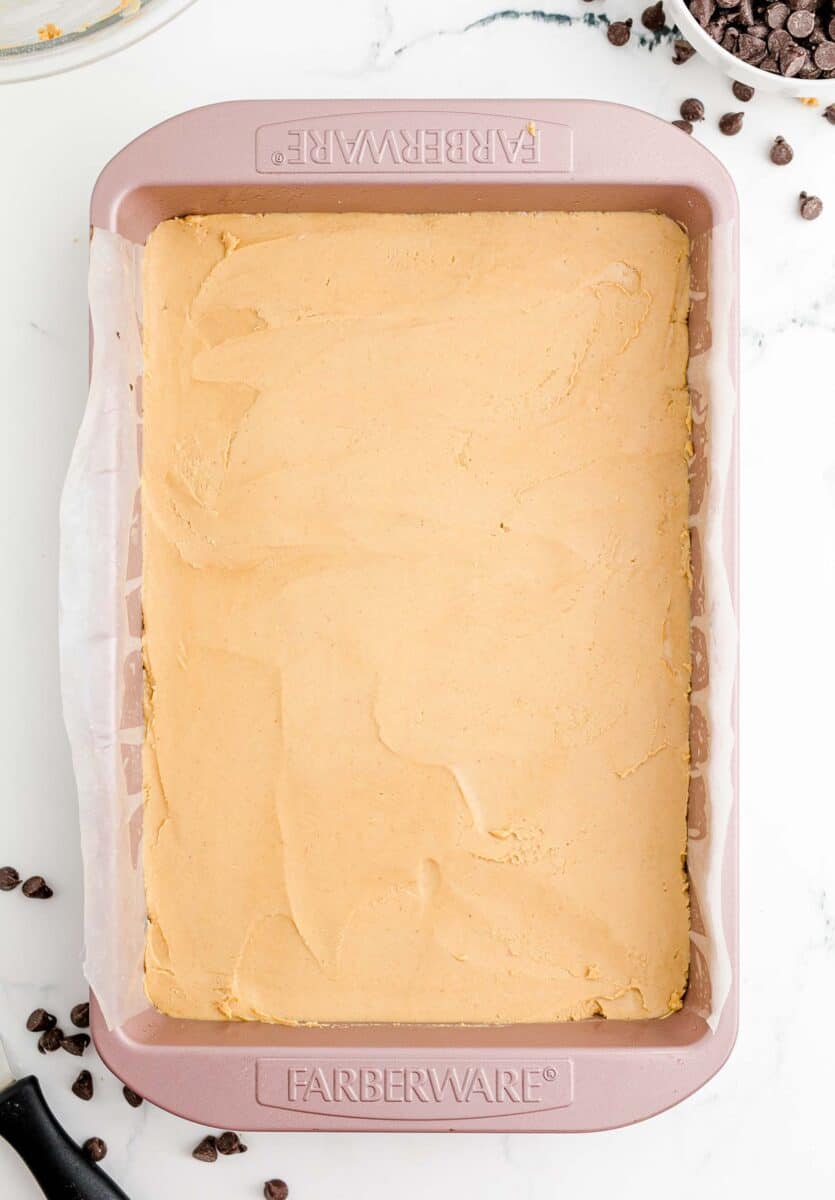 a peanut butter layer is presented in a large pan