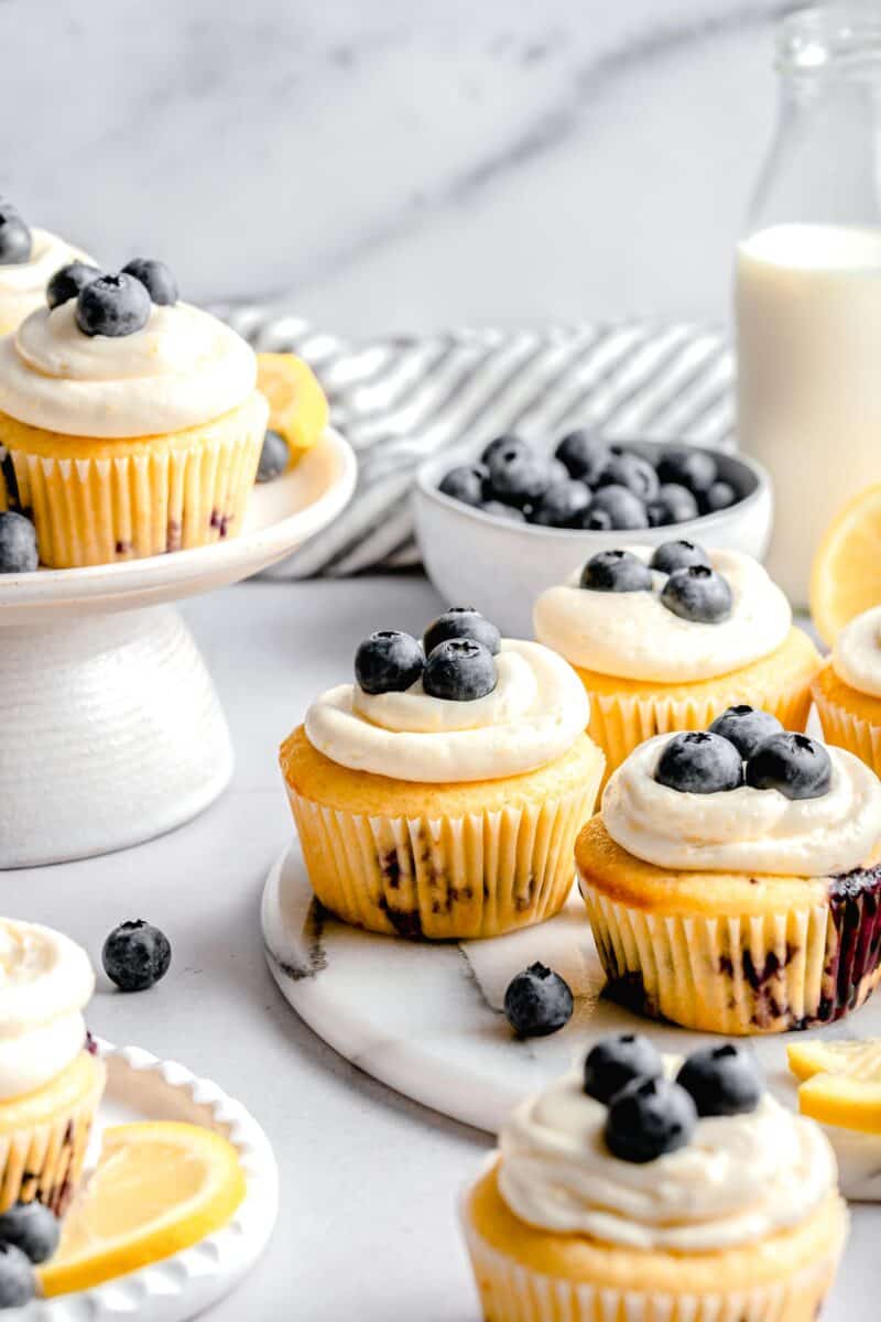 lemon blueberry cupcakes on a marble board