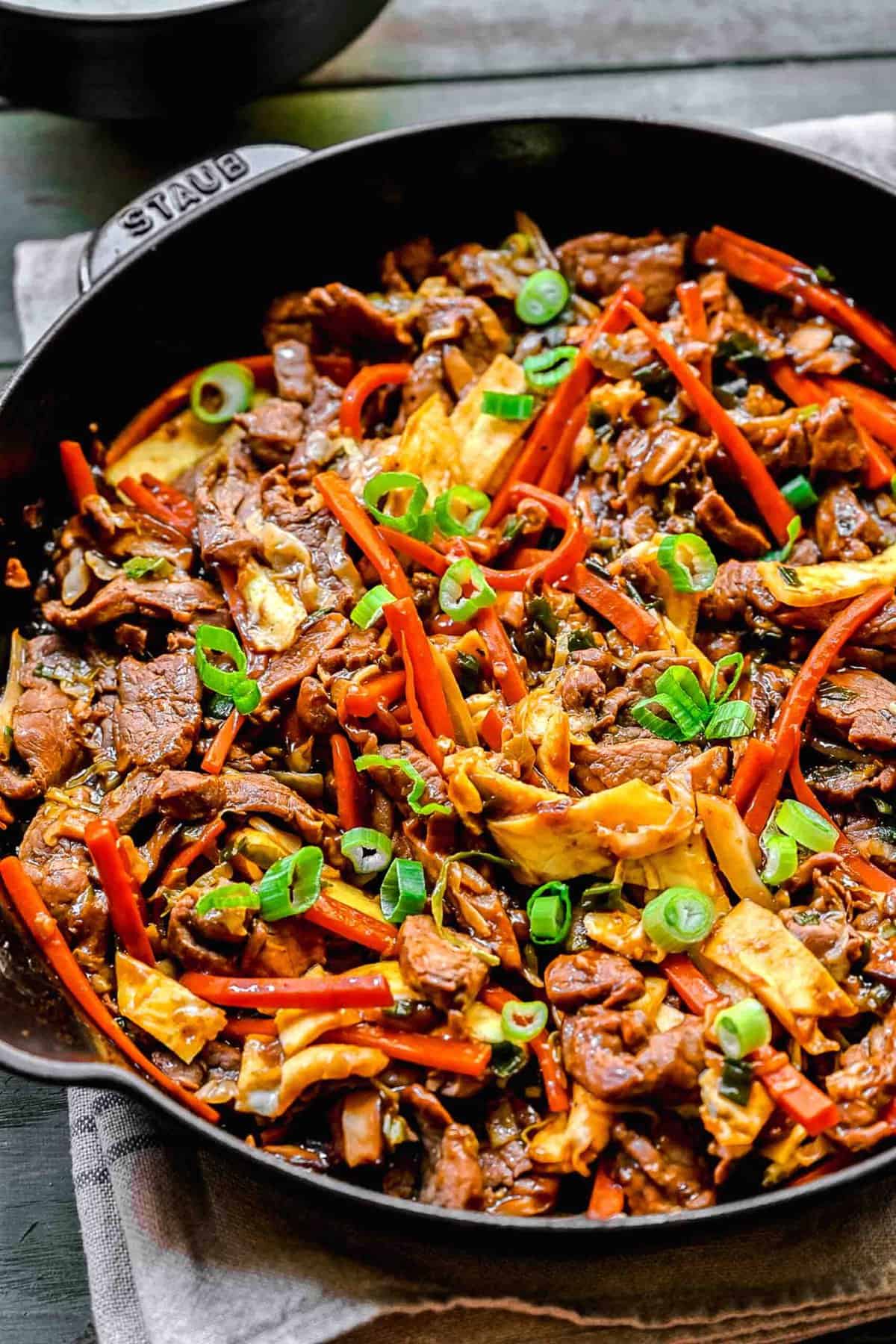 Moo shu pork in a pan ready to be served.