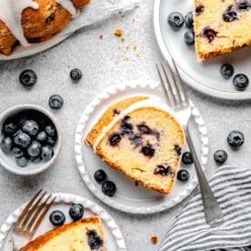 slices of bundt cake are plated on several white plates