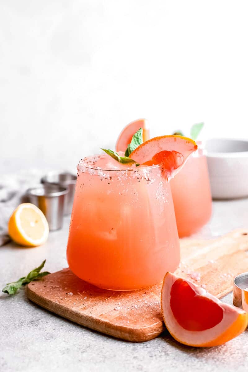 grapefruit slices are placed next to palomas