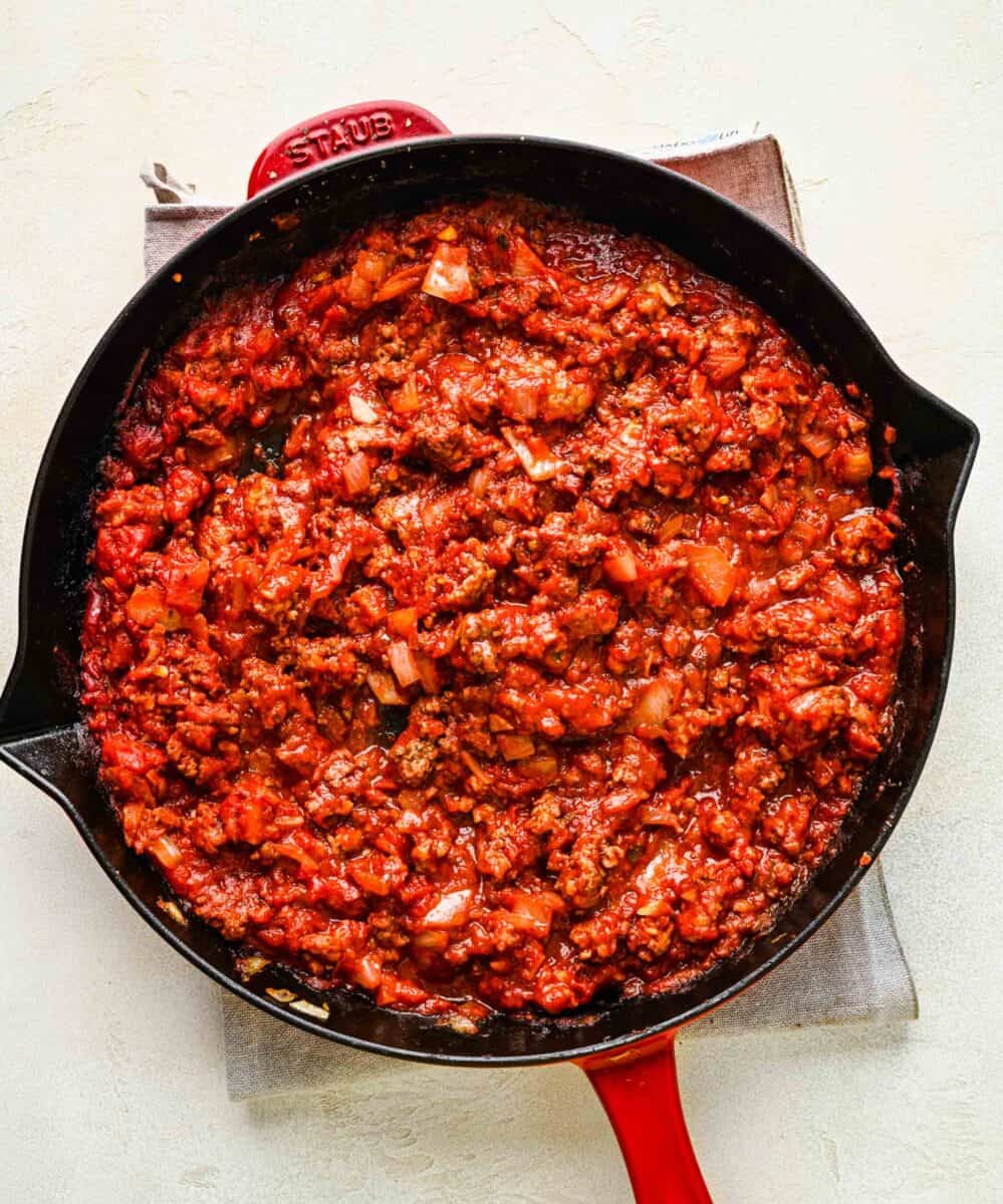 Meat and tomato sauce in a skillet.