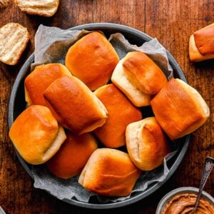 a batch of texas roadhouse rolls are placed in a basket