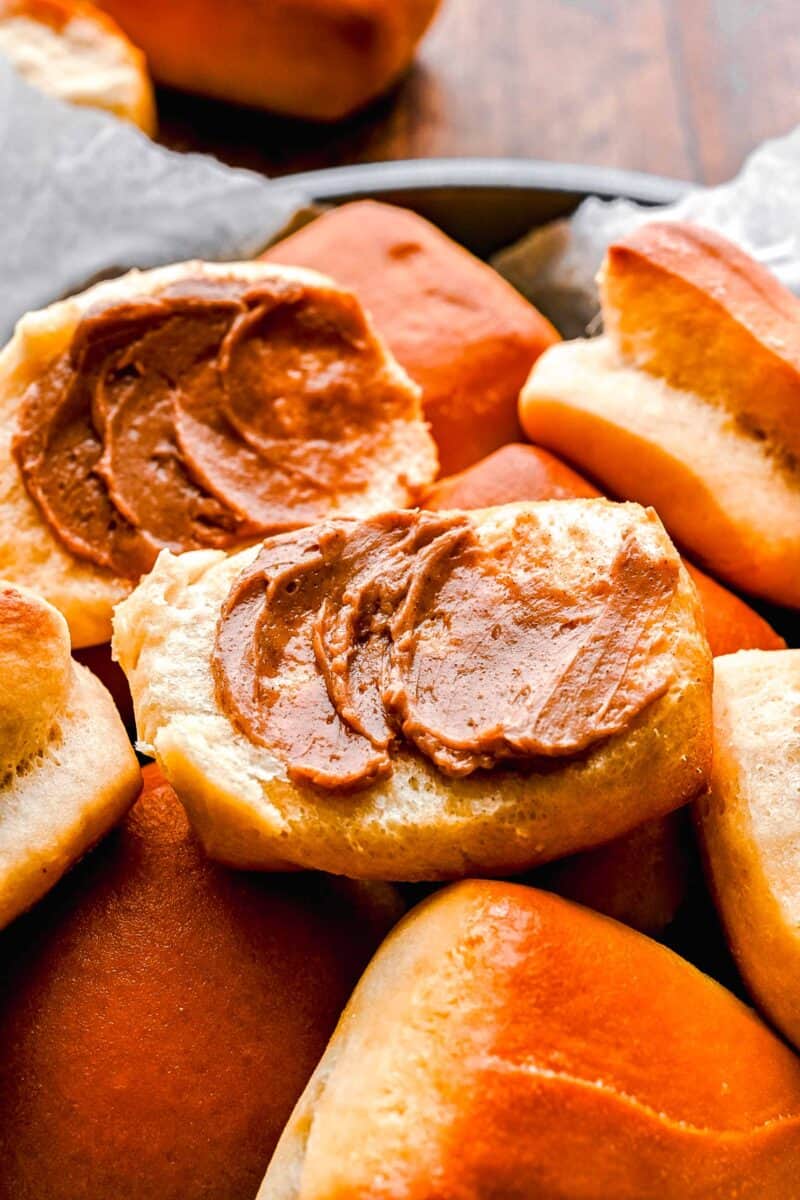 cinnamon butter has been spread on a halved roll