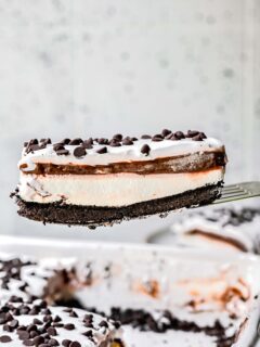 slice of chocolate lasagna on a metal spatula to show the layers