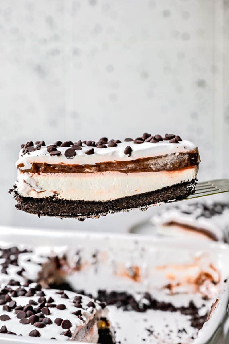 slice of chocolate lasagna on a metal spatula to show the layers