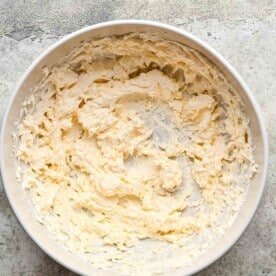 cream cheese and mayo beat together in a white bowl