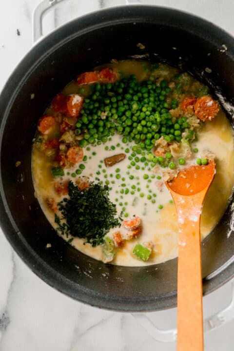 peas, fresh parsley, and chicken bouillon cube added to the liquid mixture