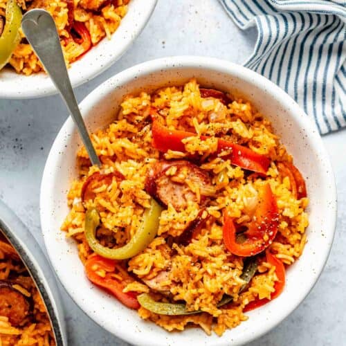 https://www.tablefortwoblog.com/wp-content/uploads/2023/10/sausage-and-peppers-with-rice-photo-tablefortwoblog-6-500x500.jpg