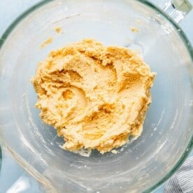 Mixing together wet and dry ingredients for lemon cookie dough.