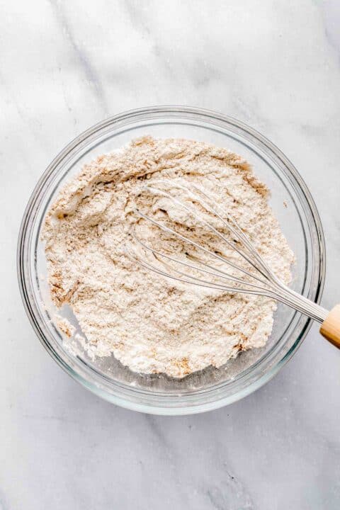Whisking together dry ingredients for sweet potato bread.