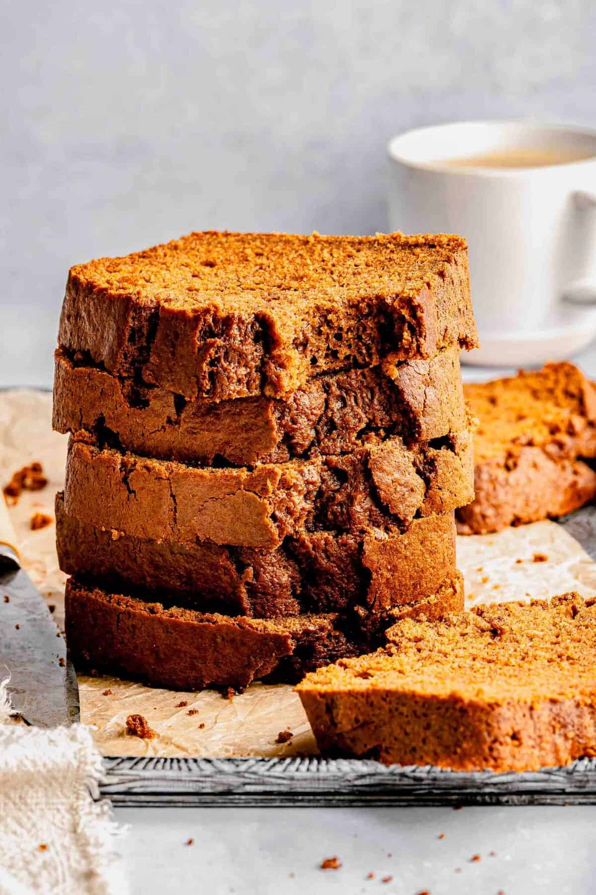 A stack of 5 slices of sweet potato bread.