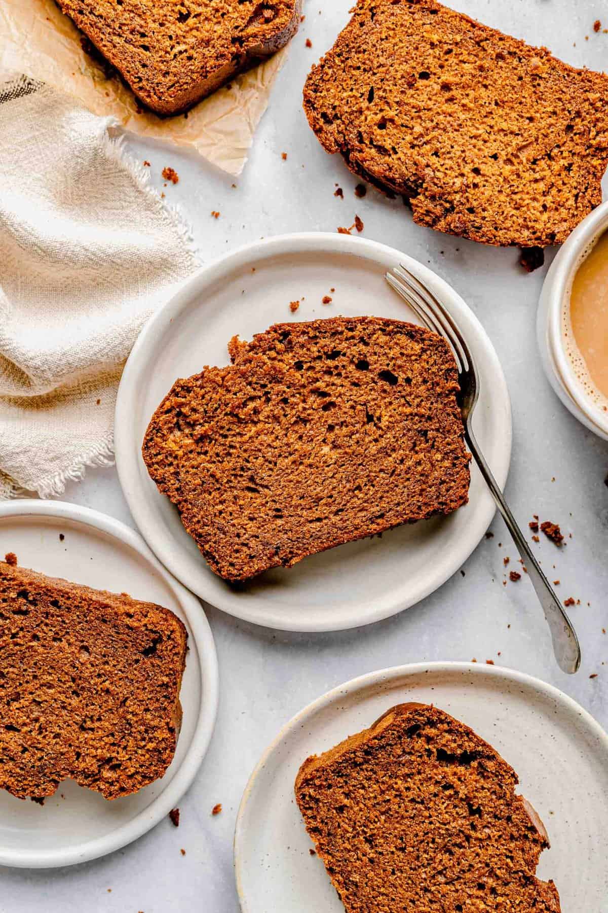 Sweet potato bread sliced and served on plates.