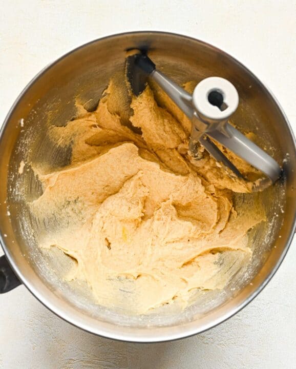 egg beaten into butter and sugar mixture in a metal stand mixer bowl with paddle attachment
