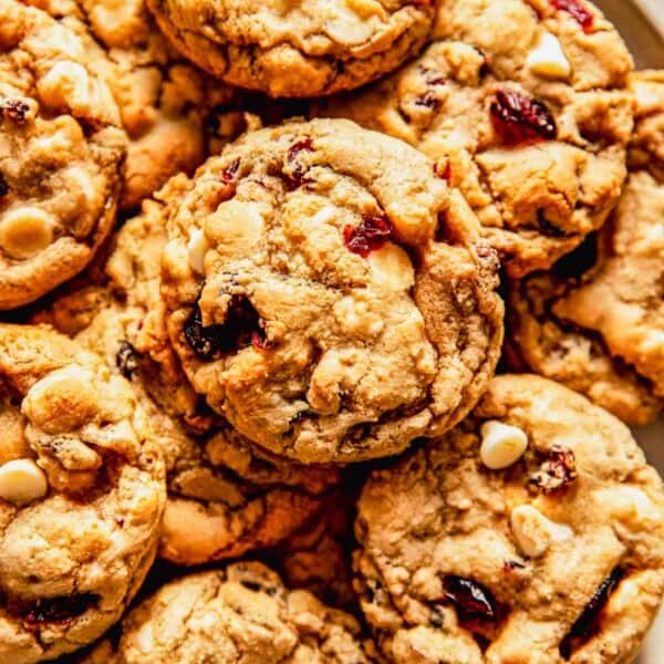 a stack of white chocolate cranberry cookies