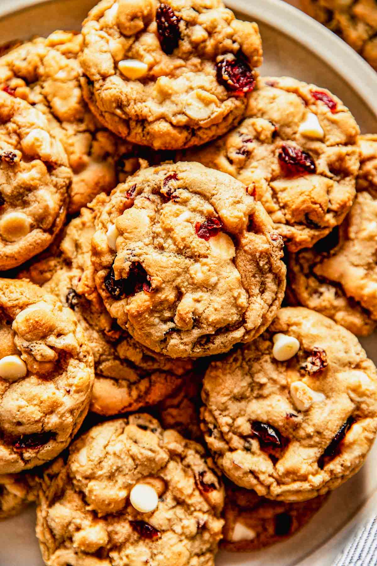 a stack of white chocolate cranberry cookies