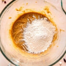 dry ingredients added on top of wet mixture in clear stand mixer bowl