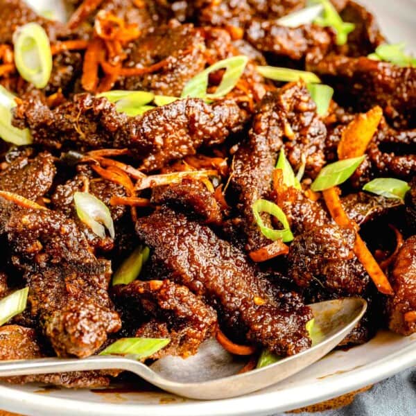 A serving platter full of crispy beef.