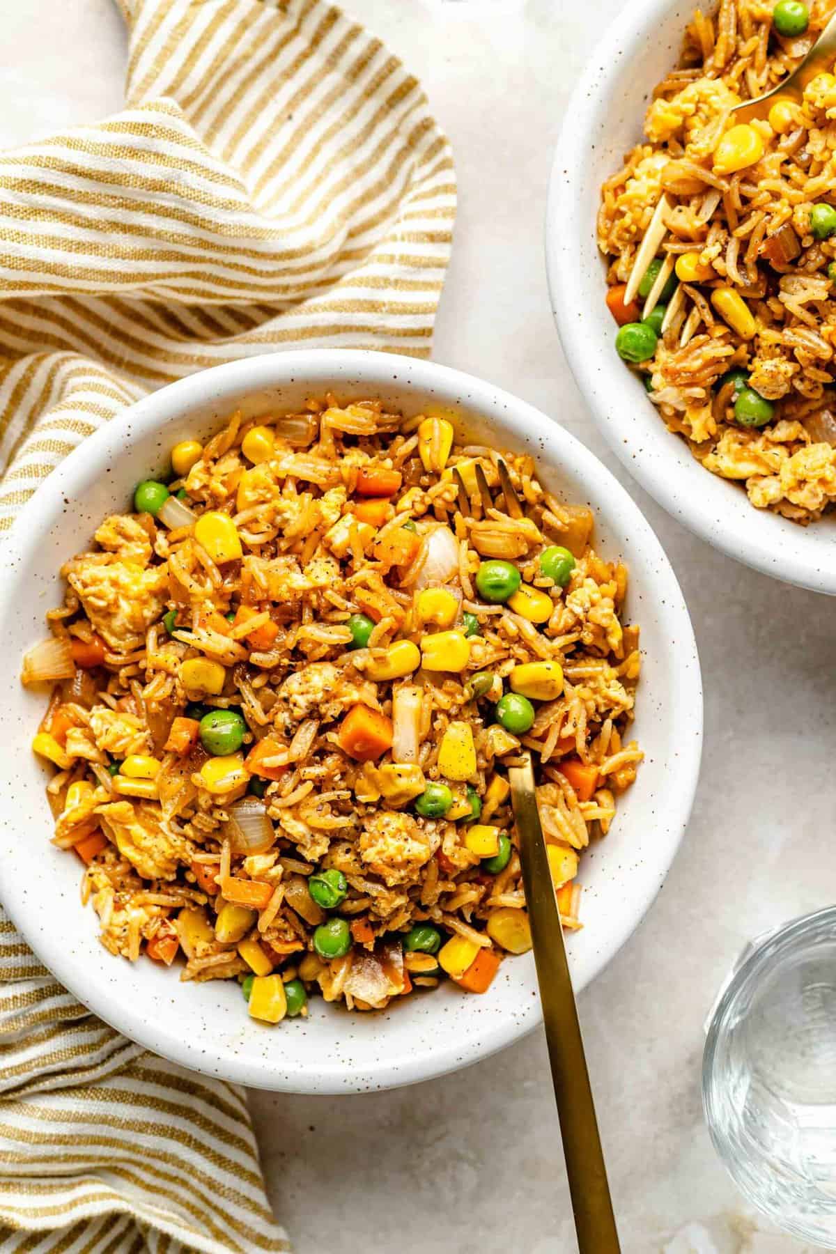 Overhead image of vegetable fried rice in a bowl.