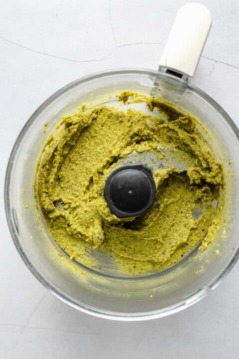 Pistachio paste in a food processor.