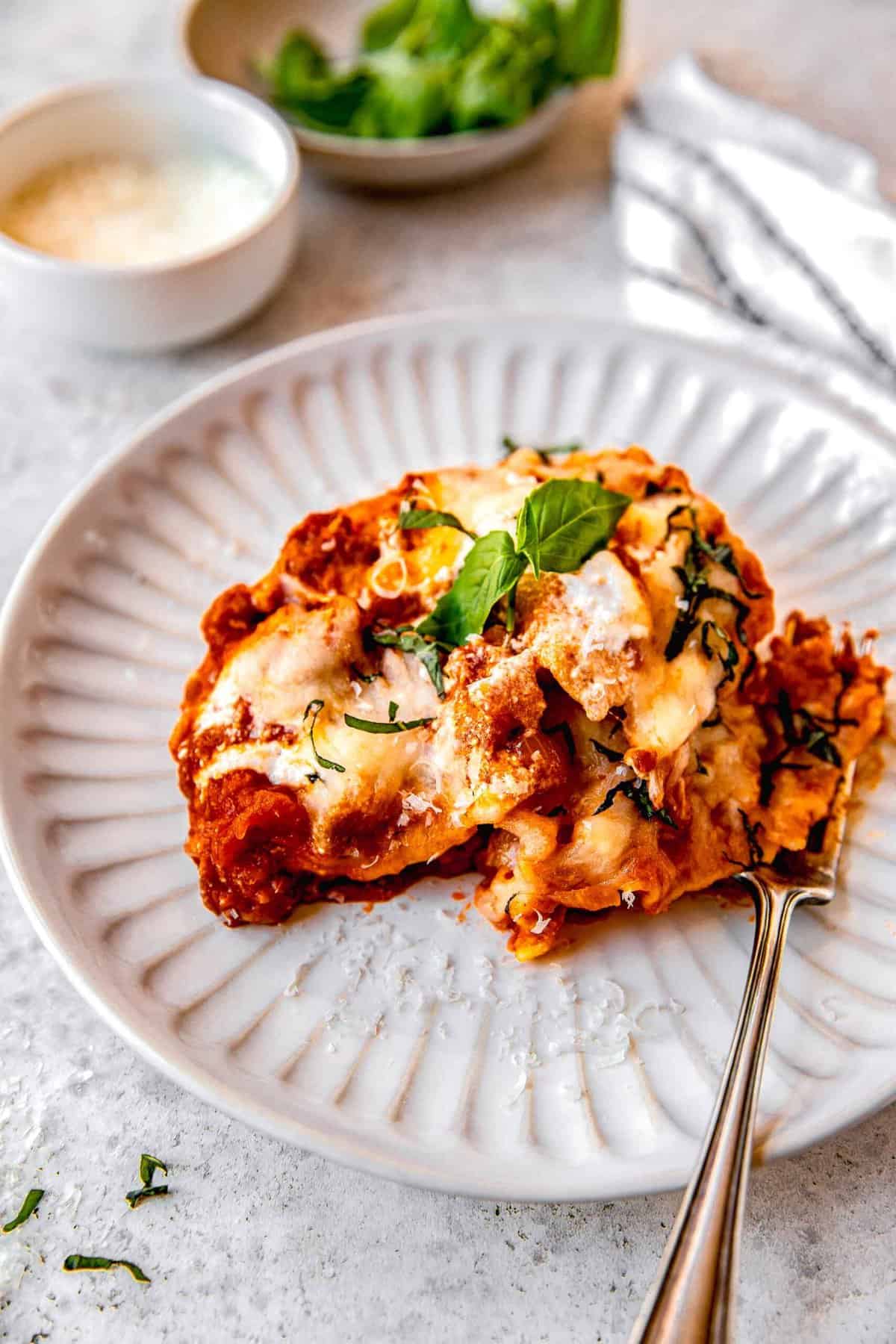 A serving of skillet lasagna on a plate.