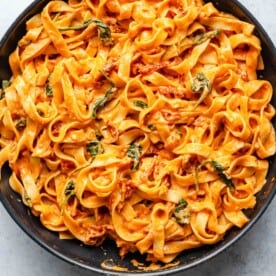 sun-dried tomato pasta in a large black skillet