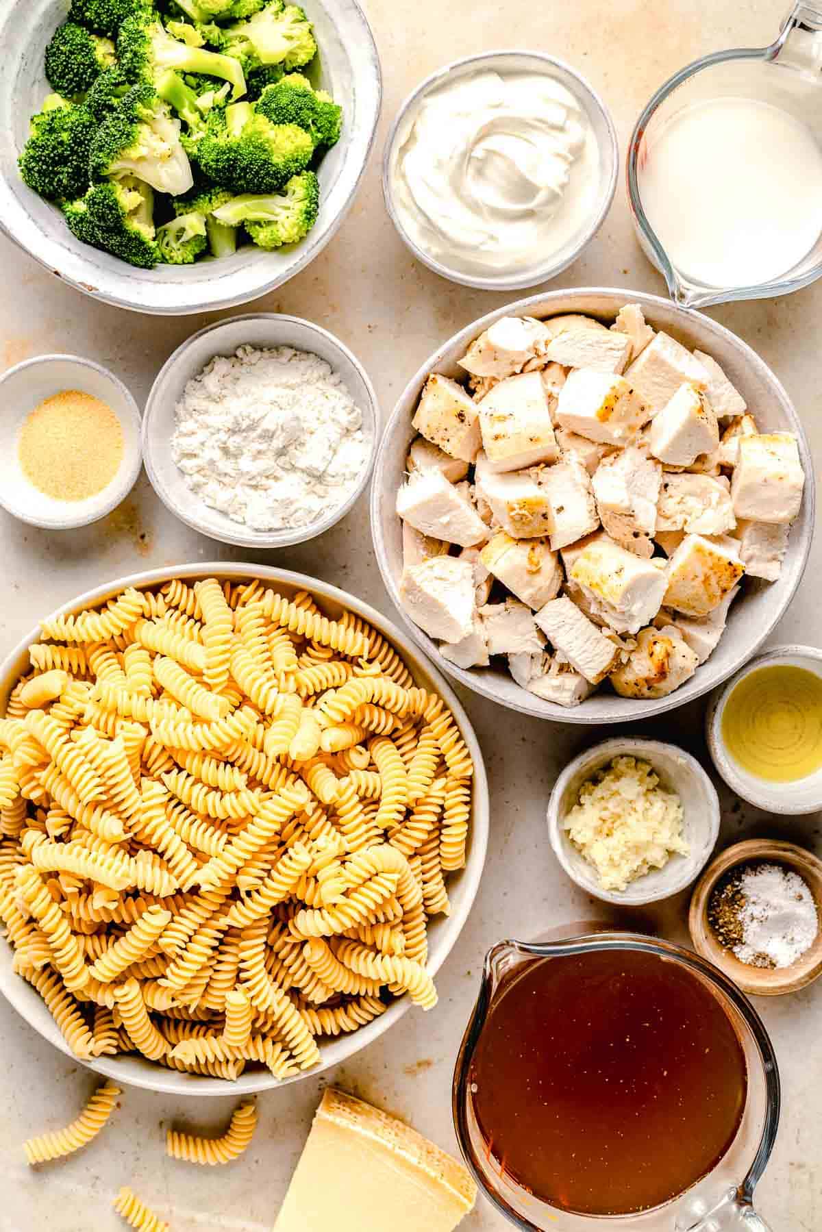 Ingredients for chicken broccoli Alfredo pasta.