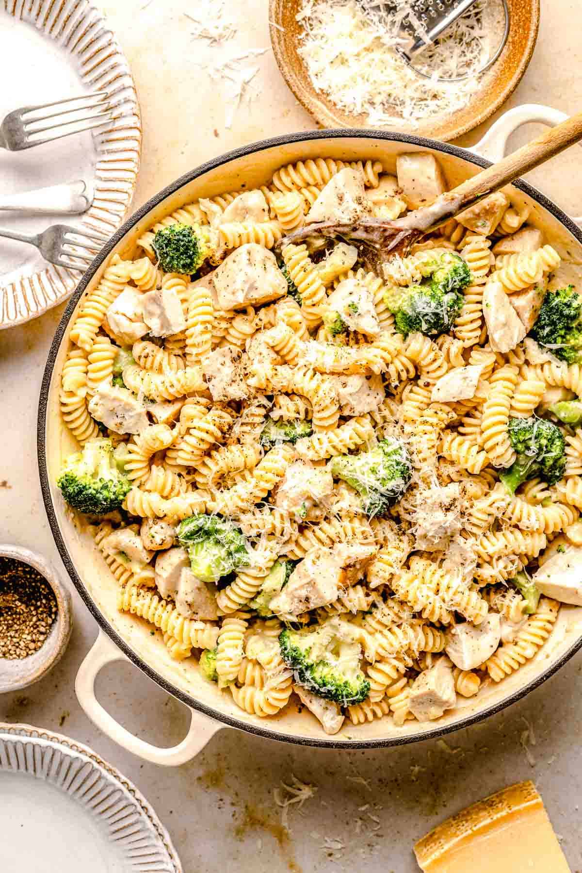Overhead image of chicken broccoli Alfredo pasta in a skillet.