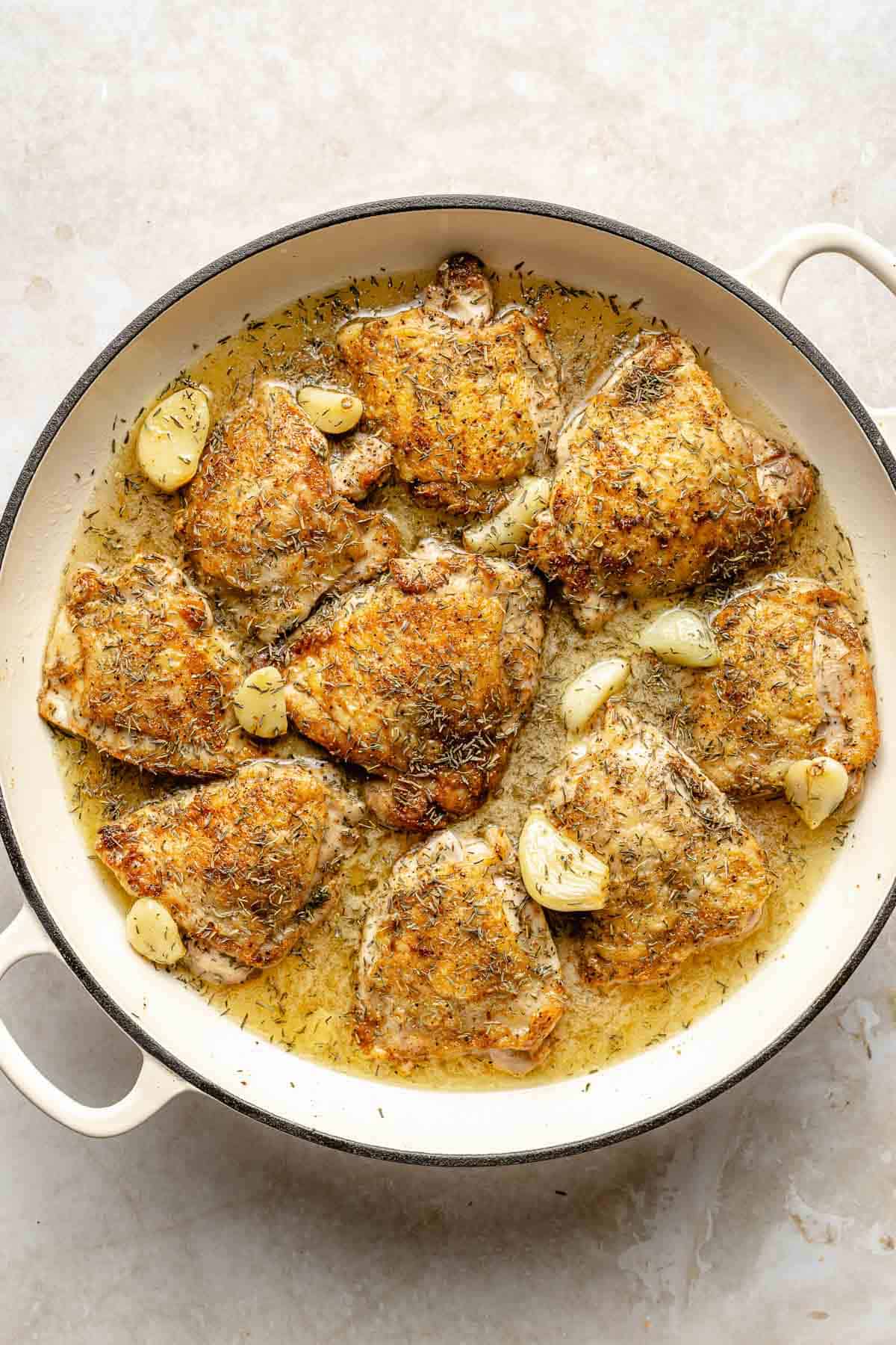 40 clove garlic chicken is made of crispy-skinned chicken in a creamy sauce loaded with the flavor of no less than 40 cloves of garlic. Seared chicken thighs simmer in a white wine-garlic sauce.