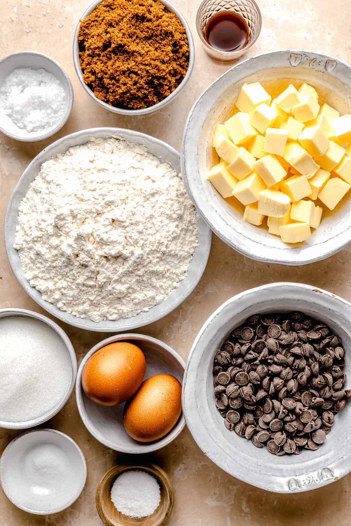 the ingredients for chocolate chip cookies are on a countertop