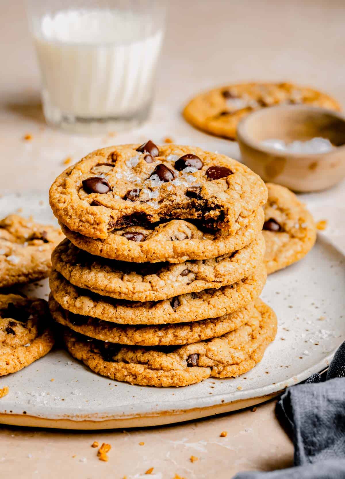 a stack of cookies is presented on a plate