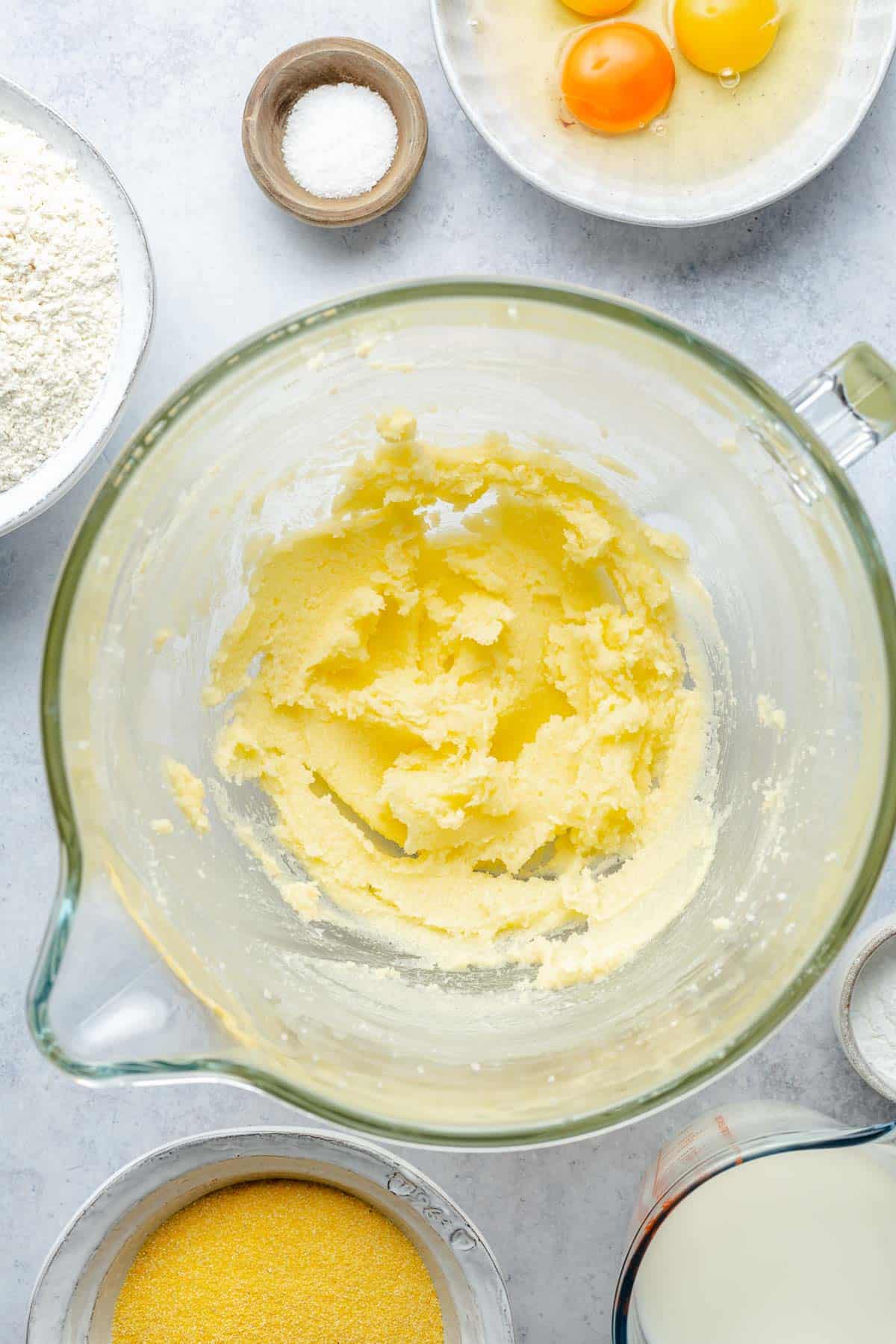 Creaming together butter and sugar for cornbread batter.