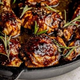 fresh rosemary garnished glazed chicken