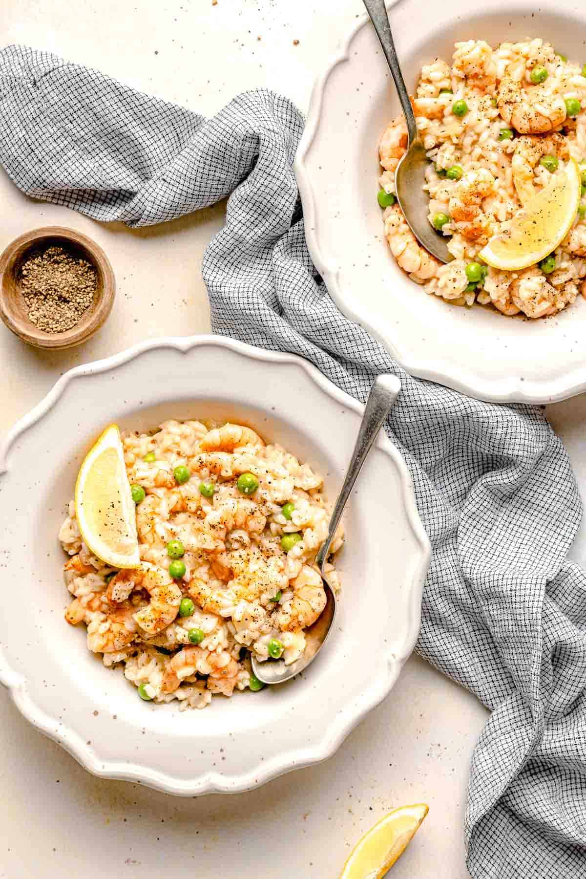 Overhead image of shrimp risotto served in bowls.