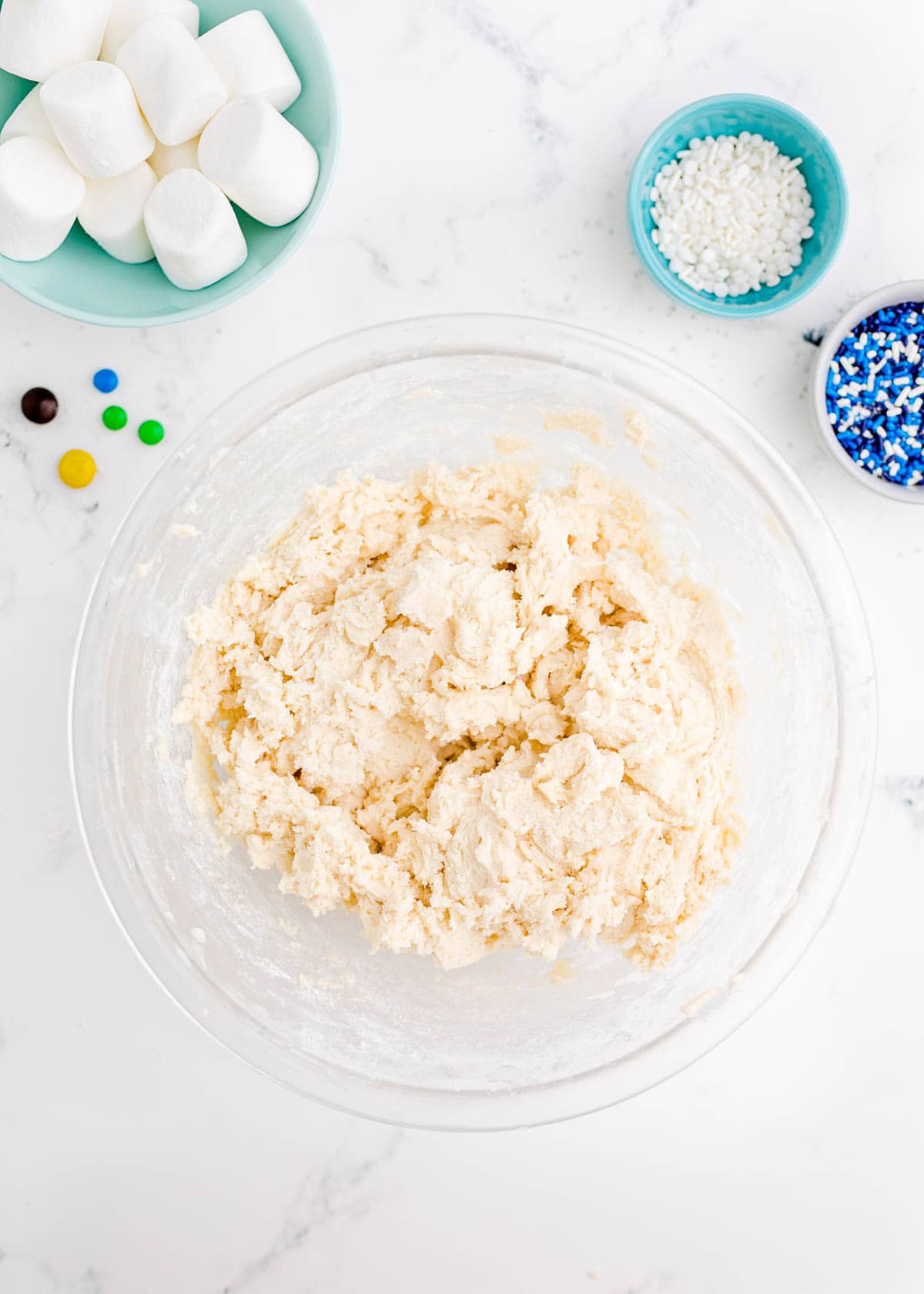 cookie dough in a clear bowl for melted snowman cookies