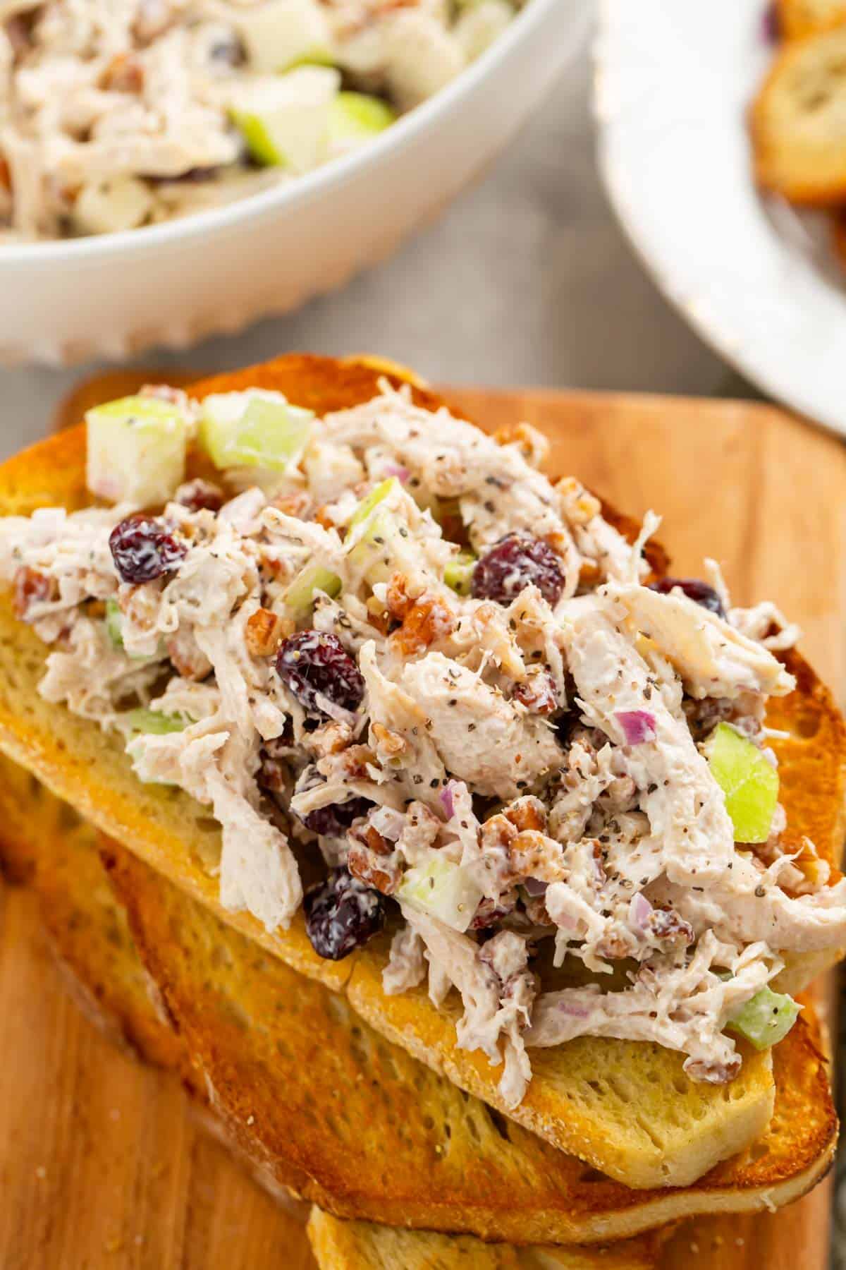 cranberry pecan chicken salad on top of toasted bread